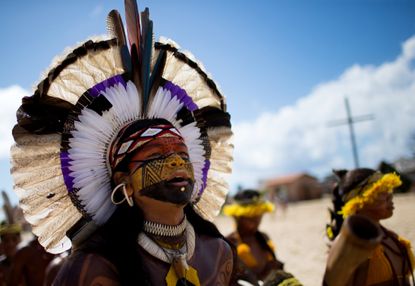 Native Brazilians sing and dance, during the Indigenous Youth Games of Pataxos nation.