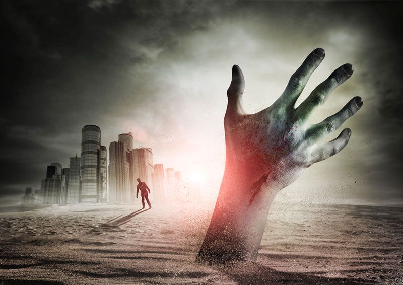 Zombie Rising. A hand rising from the ground