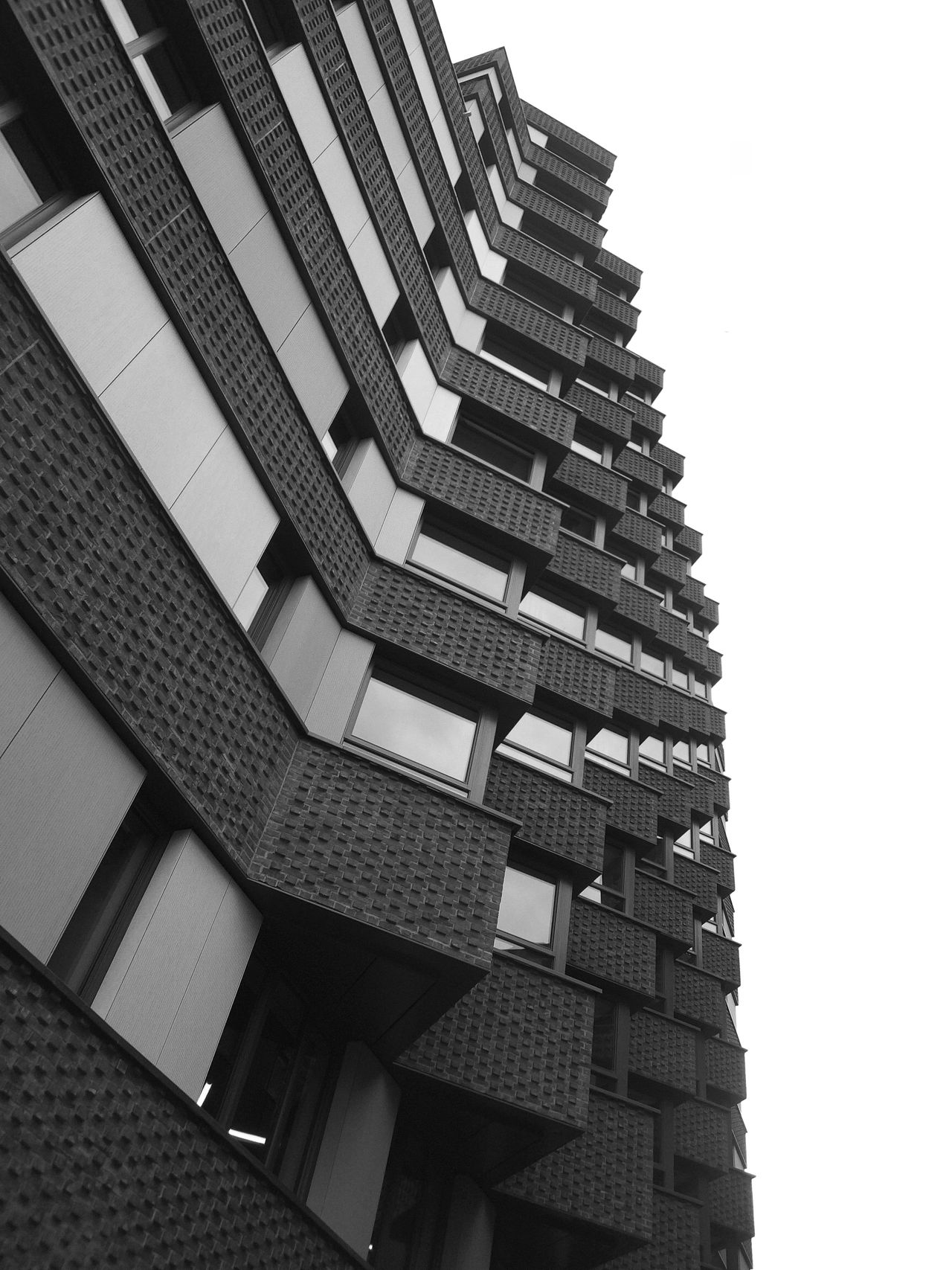 Sample image from Camp Snap CS-Pro digital compact camera showing upward view of apartment block in monochrome