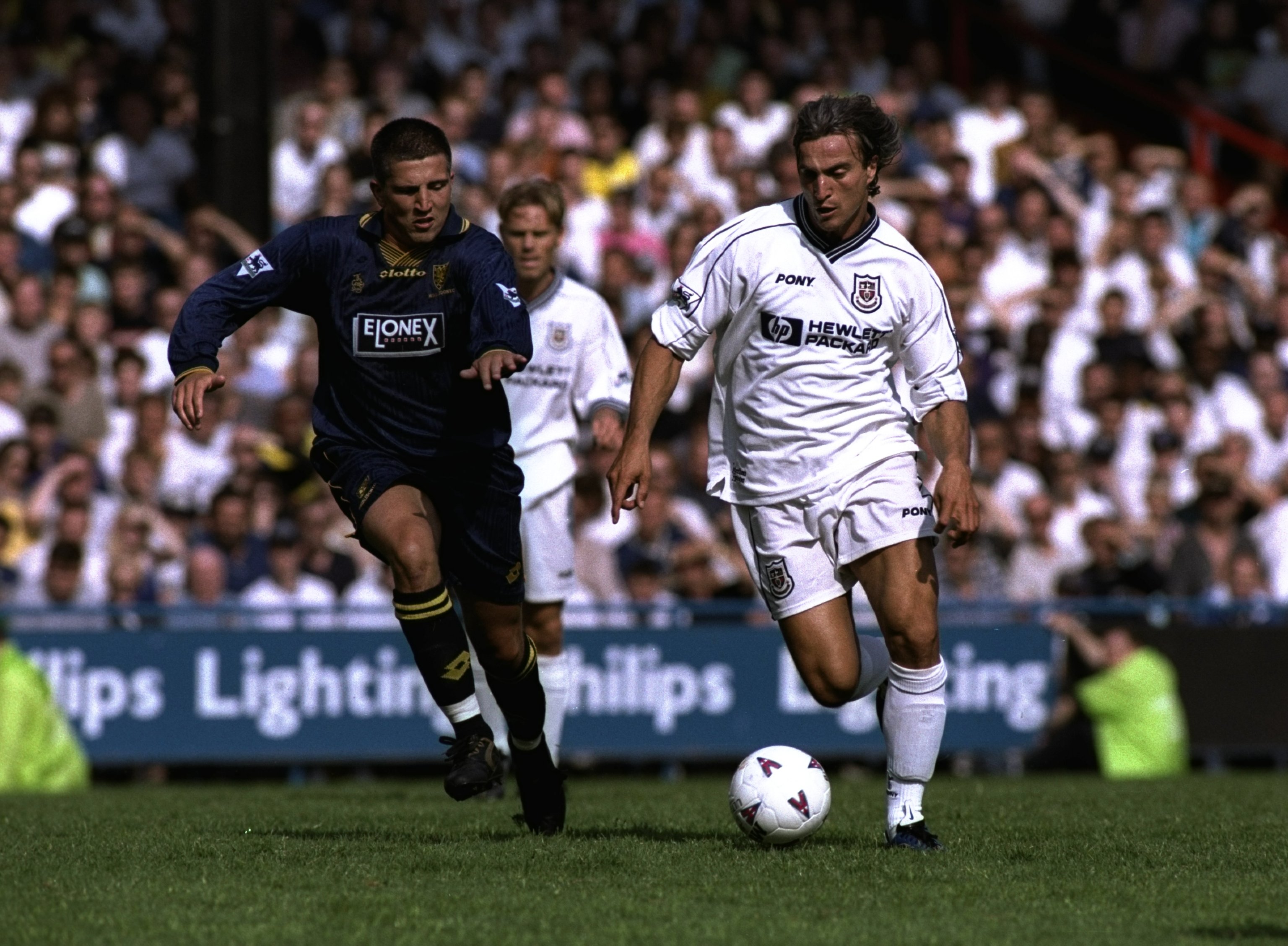 David Ginola in action for Tottenham against Wimbledon in 1998.