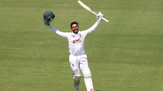 Tanzid Hasan of Bangladesh celebrates after scoring a century during day two of the First Test Match in the series between Australia and Bangladesh