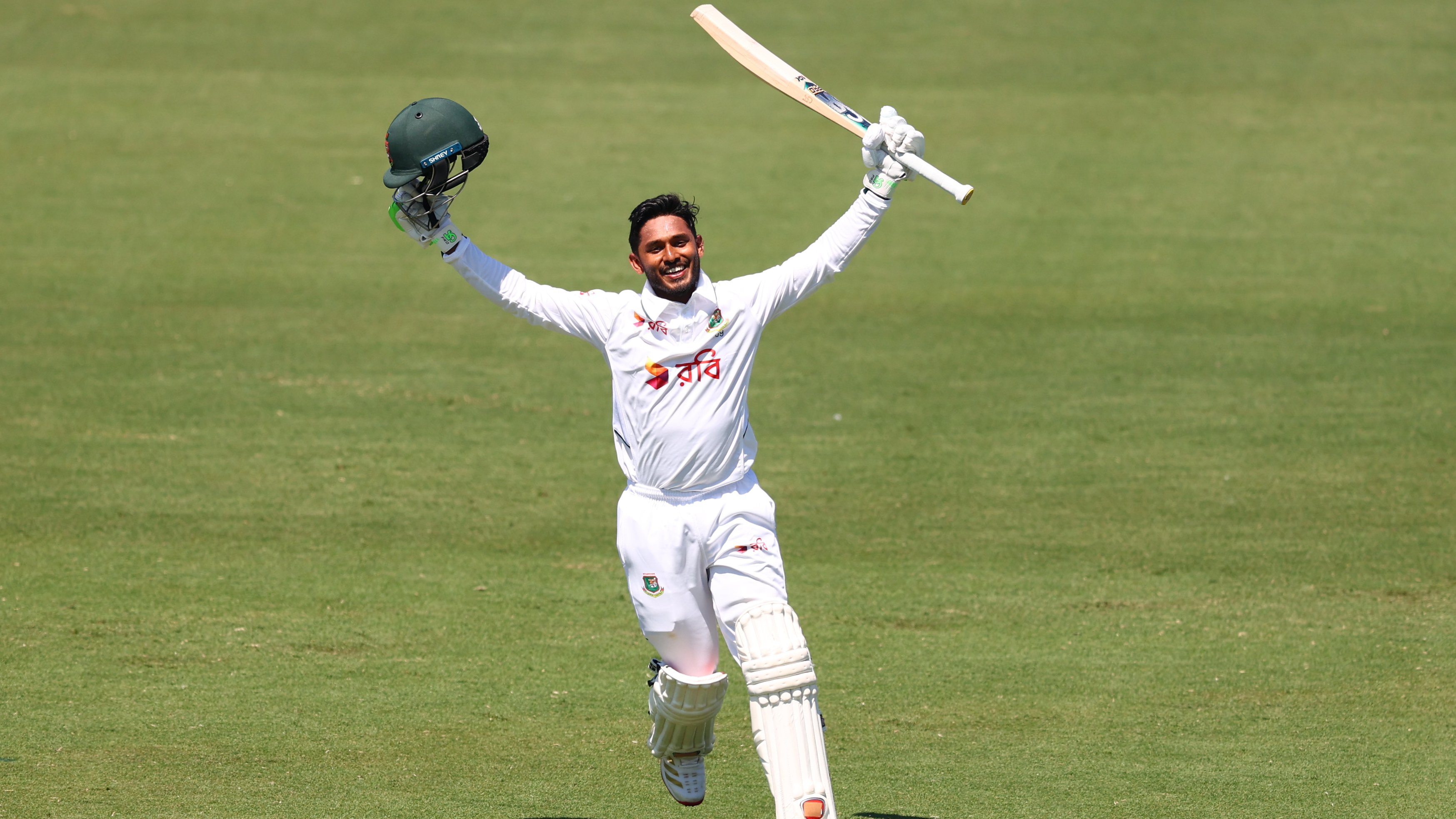 Tanzid Hasan of Bangladesh celebrates after scoring a century during day two of the First Test Match in the series between Australia and Bangladesh