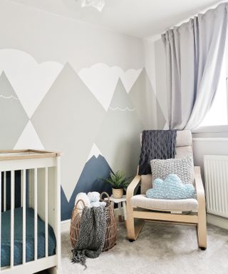 IKEA POÄNG in a nursey with painted mural