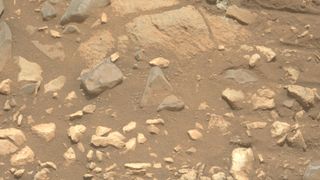 reddish-orange soil and rocks