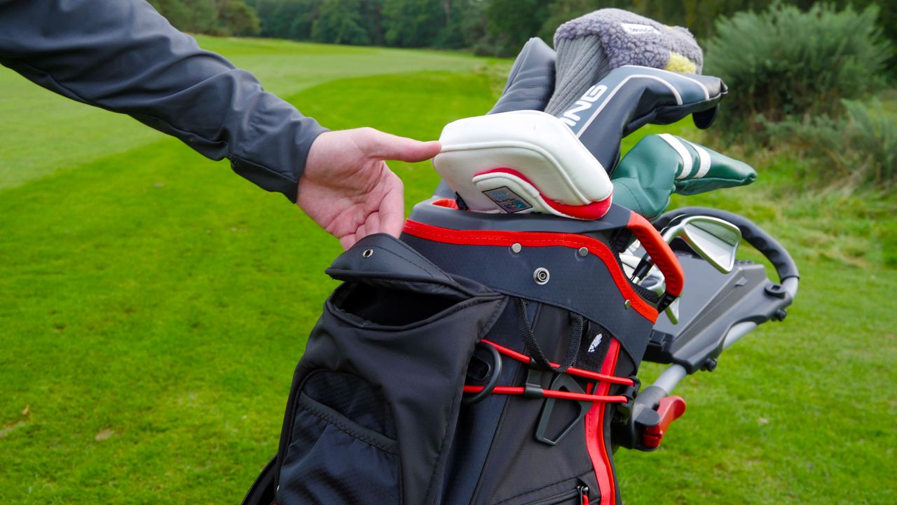 The magnetic top pocket on the Eze84 tour cart bag