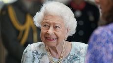 The Queen makes a heartwarming visit, Queen Elizabeth II smiles during a visit to officially open the new building at Thames Hospice on July 15, 2022 in Maidenhead, England.