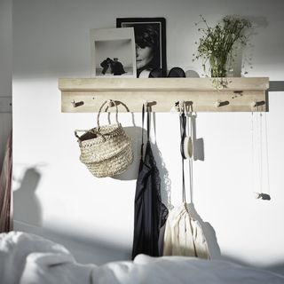 peg shelf with hanging wicker basket