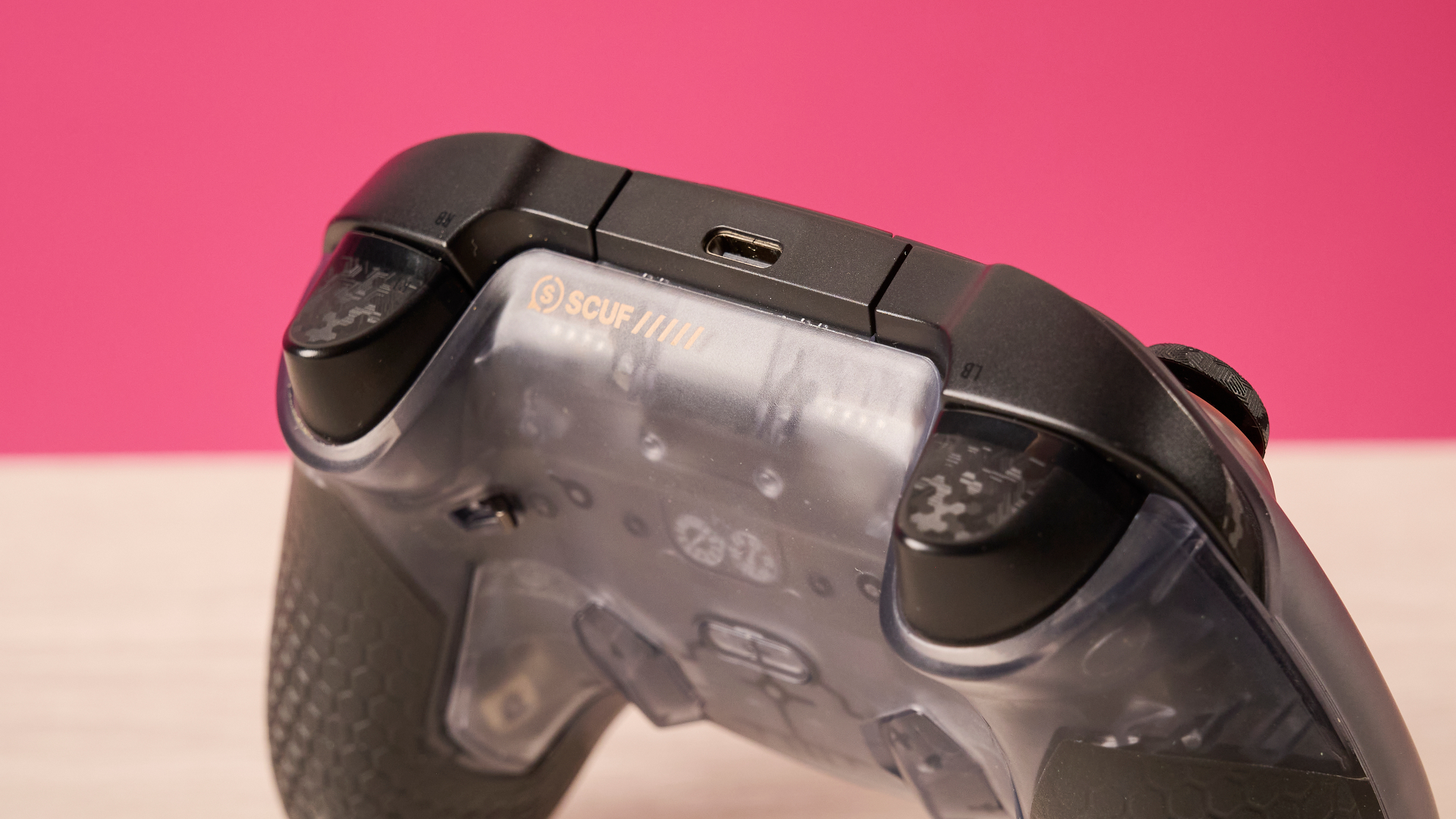 A closeup of the top of the Scuf Valor Wired with TMR, showing its triggers, shoulder buttons and USB-C port.