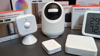 SwitchBot smart home products on a table