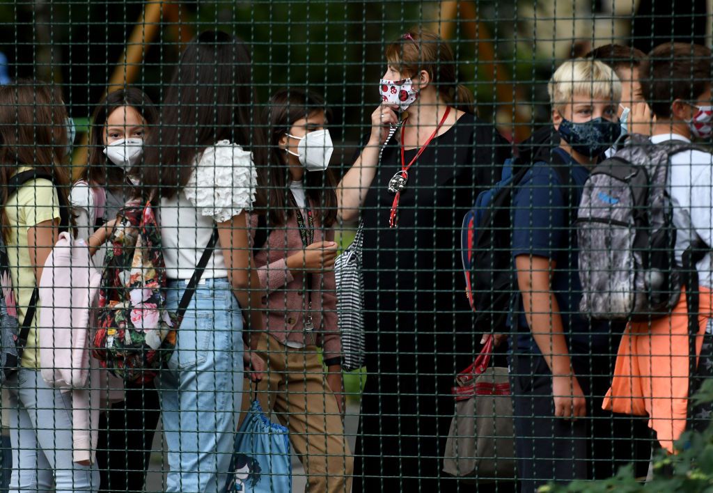 Children wearing masks.