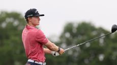 Blades Brown hits a drive