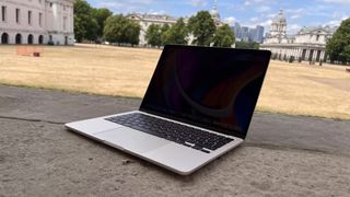 MacBook Air 2022 on a wall at the park