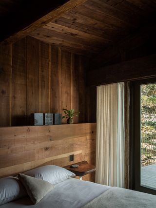 Wooden bedroom interiors and wooden rooftop