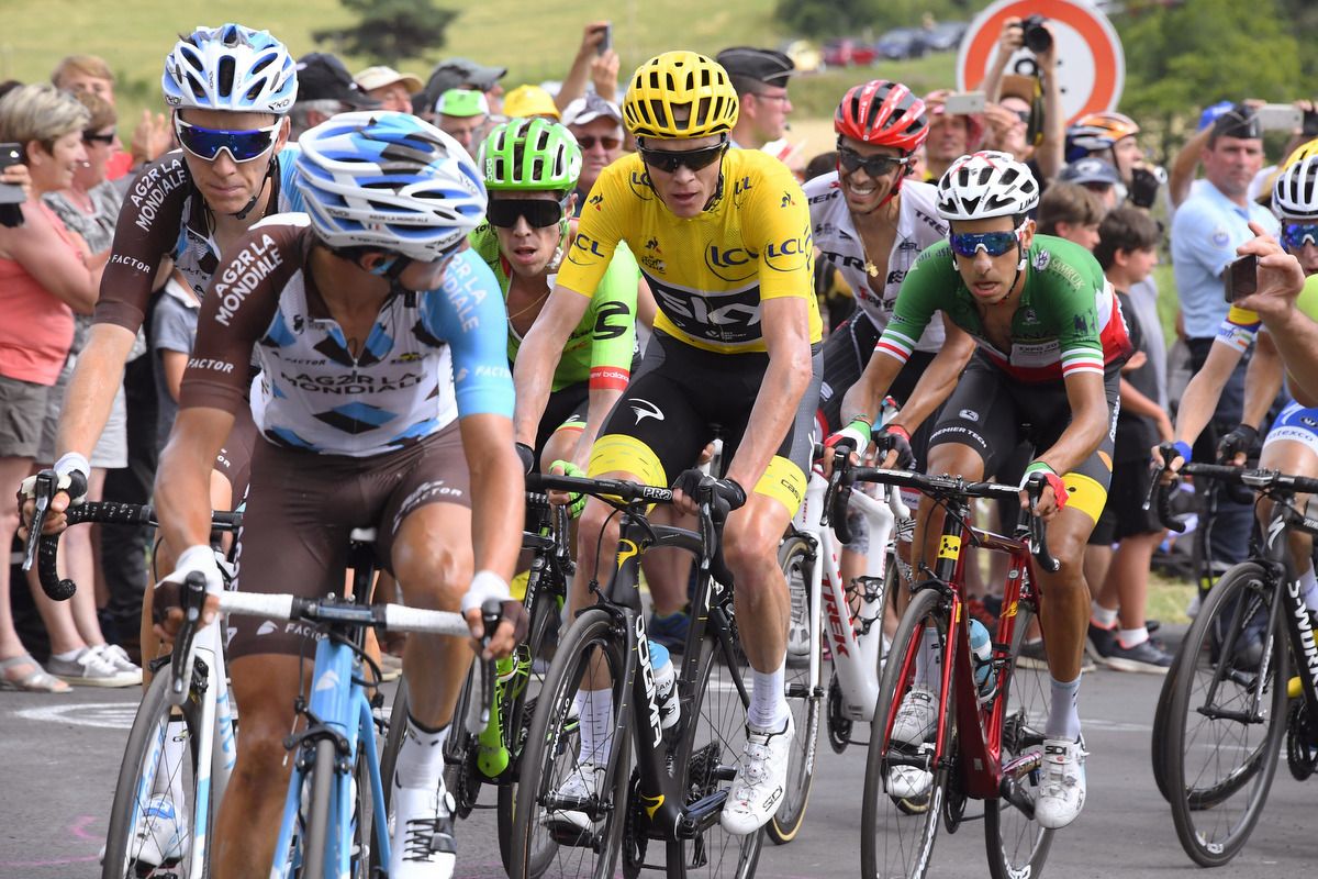 Alberto Contador (Trek-Segafredo) at the back of the yellow jersey group in the red helmet