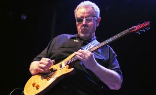 Rich Williams performs with Kansas at the Chastain Park Amphitheater on August 14, 2013 in Atlanta, Georgia