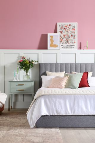 white half wall panelling with pink paint in bedroom
