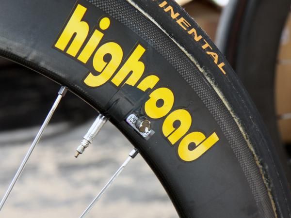 This HTC-Highroad rim has both a bit of electrical tape to keep the valve stem quiet as well as a magnet glued on for the wireless speed sensor.