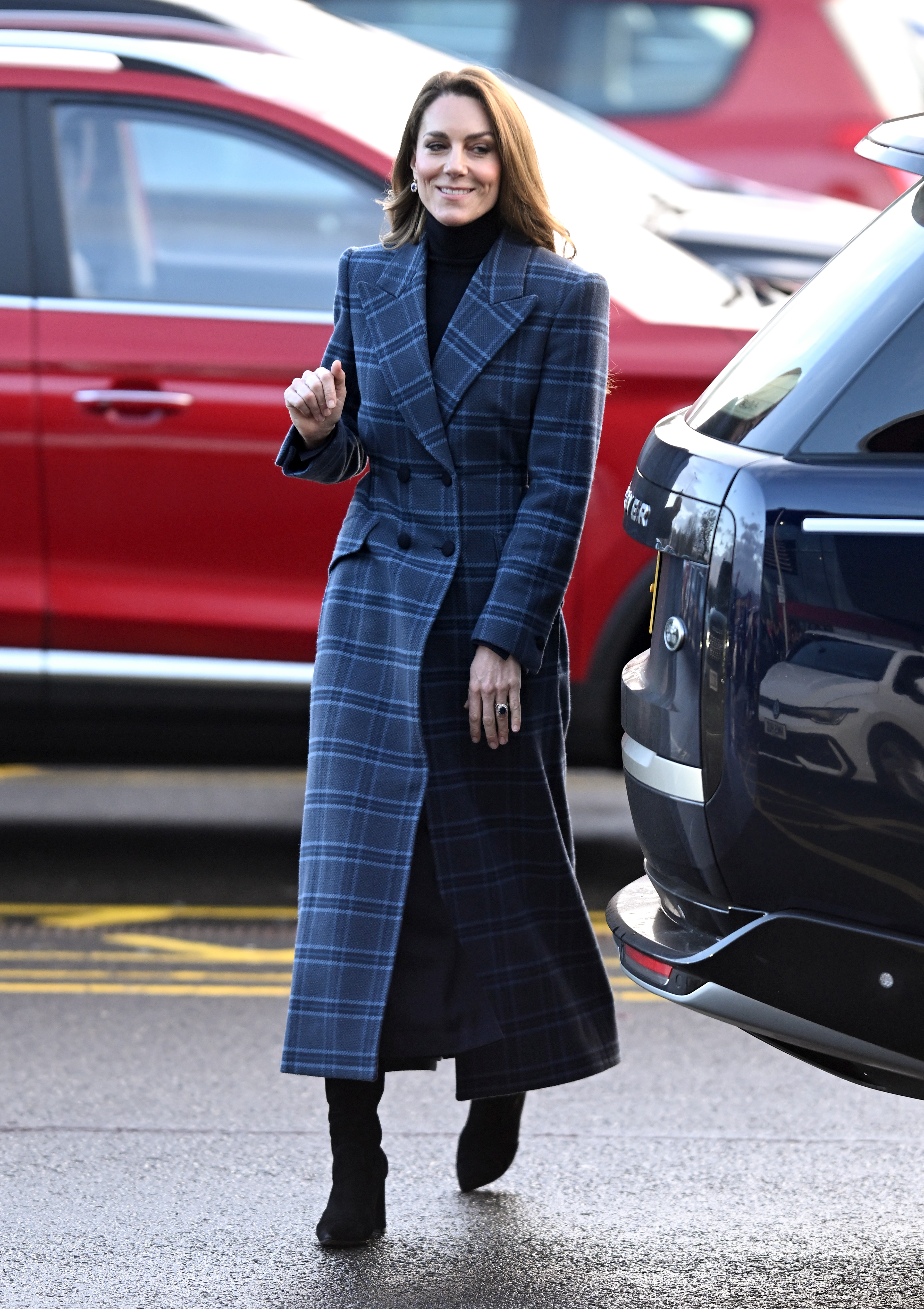 Catherine, Princess of Wales smiles as she arrives for a visit to the National Curling Academy with Prince William, Prince of Wales on January 20, 2026 in Stirling, Scotland.