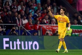 Joao Felix of FC Barcelona celebrates after scoring his team's first goal during the LaLiga EA Sports match between Atletico Madrid and FC Barcelona at Civitas Metropolitano Stadium on March 17, 2024 in Madrid, Spain. (Photo by Diego Souto/Getty Images)