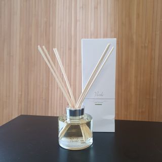 The White Company Verde reed diffuser with its box