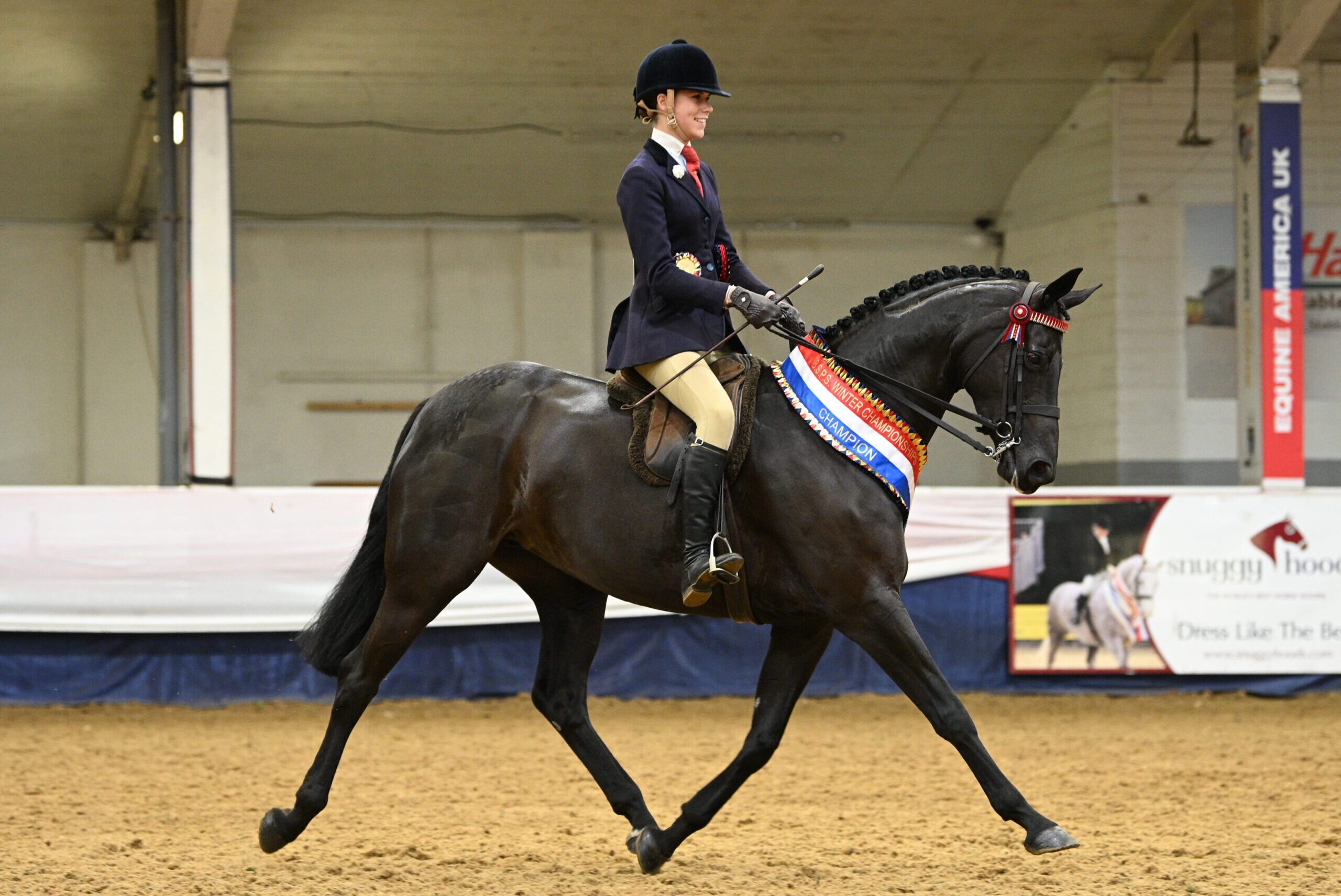 Grace Lockyer and Littletons Tiger Lily trot from the ring the challenge intermediate champions at the 2026 BSPS Winter Championships