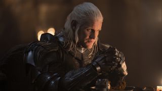 Daemon Targaryen sits wearing his suit of armor in House of the Dragon season 2