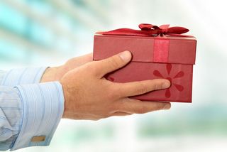 business man offering a gift