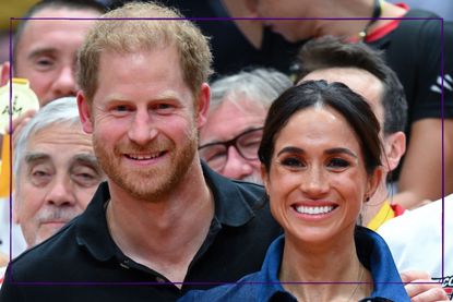 Prince Harry and Meghan Markle smiling at Invictus Games