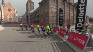 An group of virtual riders pass through the pixelated streets of Leuven