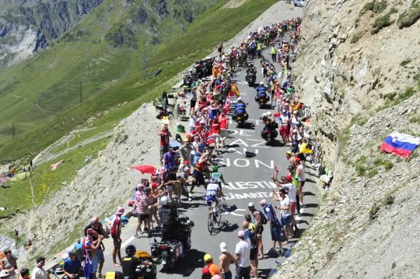 Thomas Voeckler (Europcar) and Brice Feillu (Saur-Sojasun) work their way through the crowds