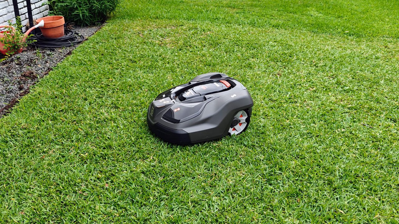 Husqvarna Automower 450XH Robotic Lawn Mower being tested in writer's yard