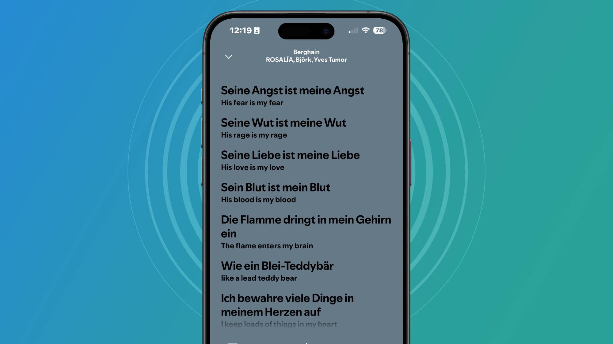 A smartphone showing lyric translations in the Spotify app