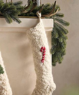 Chunky Knit Holiday Icon Stocking on the mantelpiece.