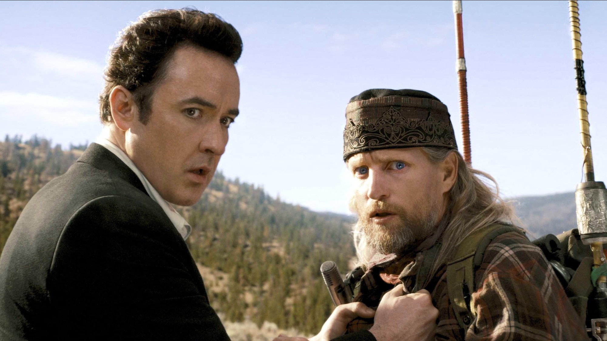 John Cusack and Woody Harrelson in 2012 movie