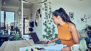 Woman running her business from home.