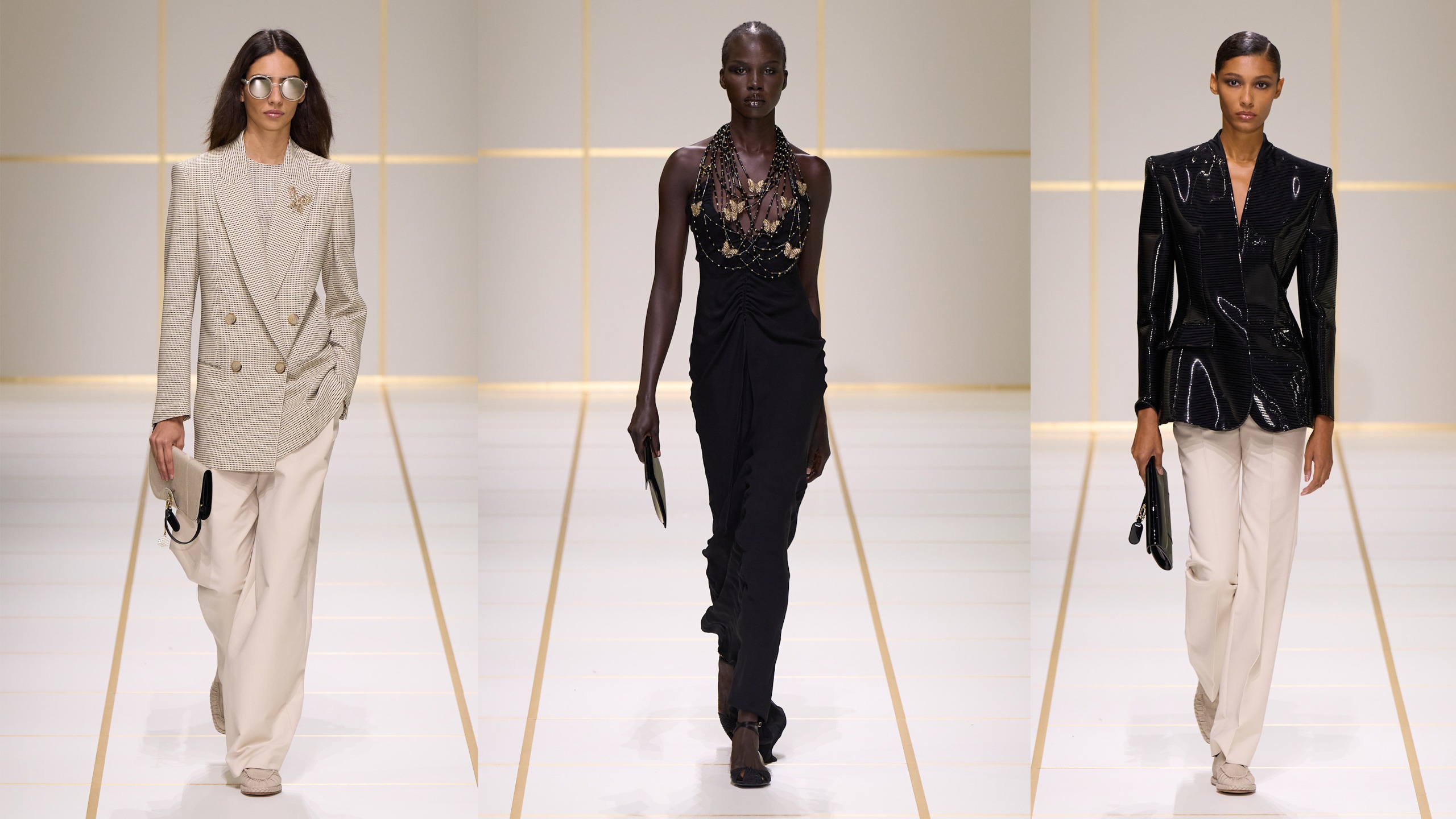three models walk the giorgio armani spring 2027 show.