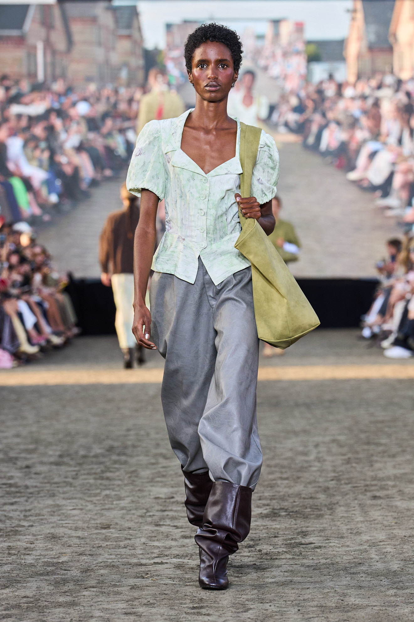 Baum Und Pferdgarten model wearing riding boots.
