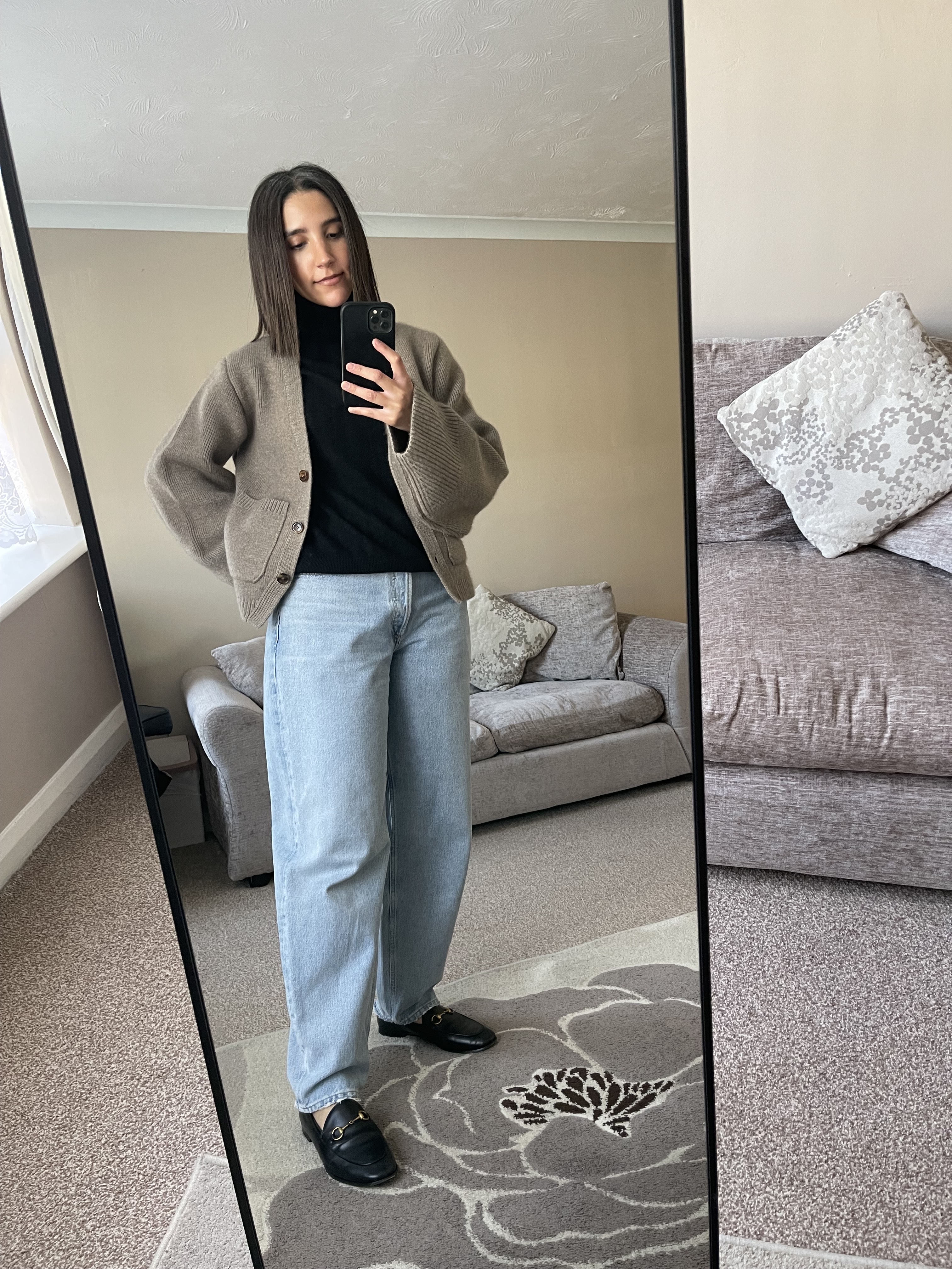 An image of Humaa Hussain wearing one of the best turtleneck from Uniqlo.