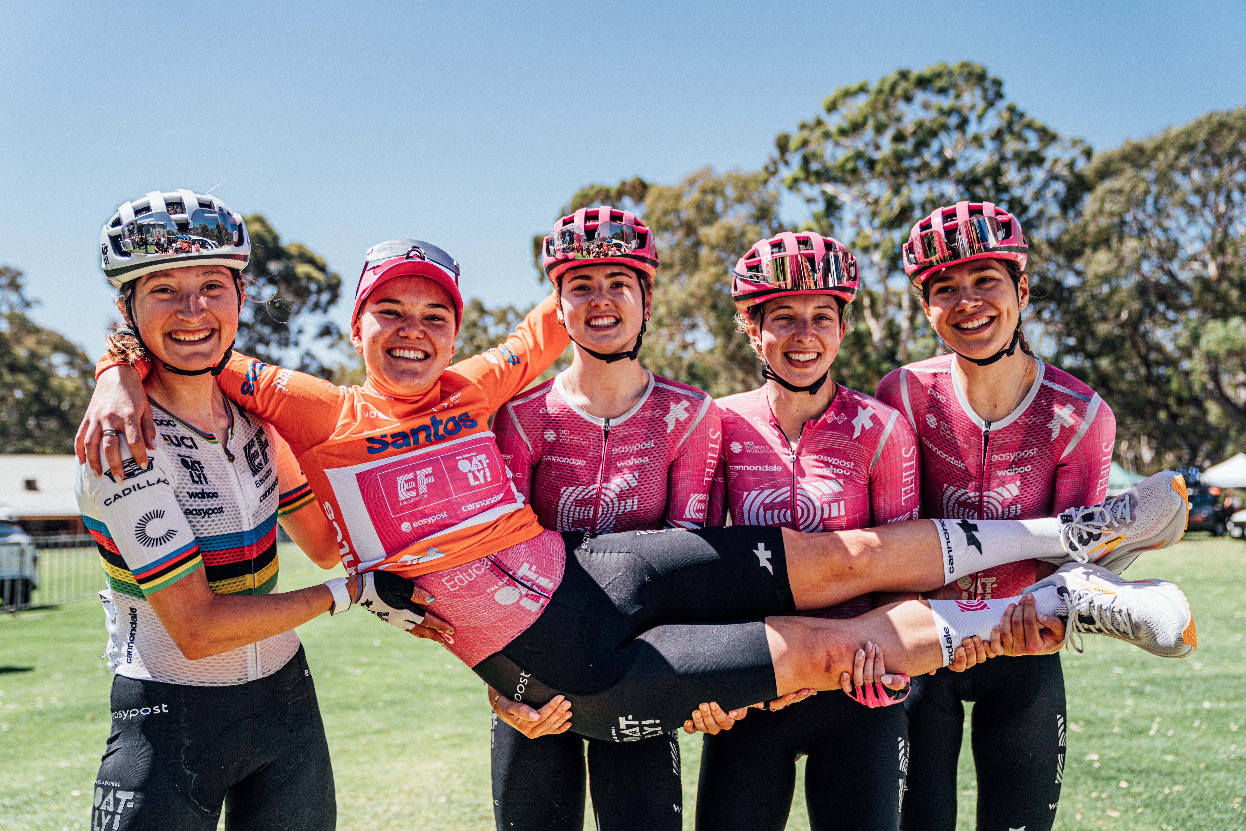 Noemi R&amp;uuml;egg held up by her EF Education-Oatly teammates at the Tour Down Under
