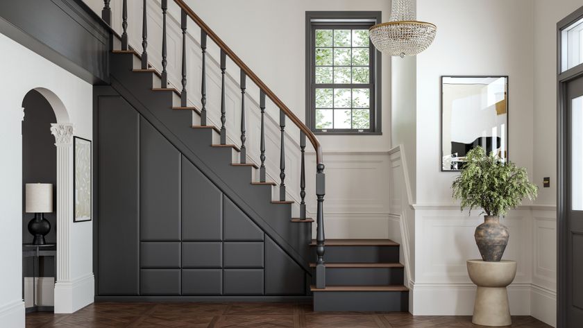 grey painted staircase with built in bespoke understairs storage