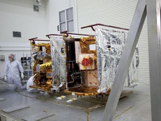 NASA's Gravity Recovery and Interior Laboratory, or GRAIL, twin spacecraft stand side by side.
