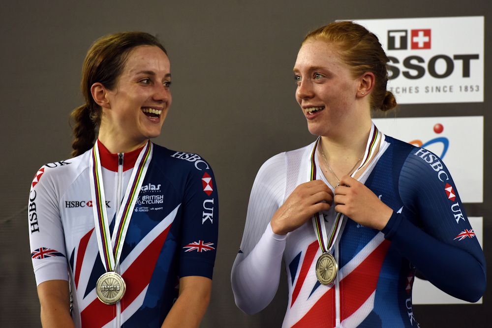 Britain's Elinor Barker and Emily Nelson chat as they wear their silver medals during the podium ceremony for the women's madison at the 2017 Track Cycling World Championships