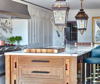 Wood and white kitchen with black and silver hardware