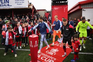 TAMWORTH, ENGLAND - JANUARY 12: James Maddison of Tottenham Hotspur leads the team out prior to the Emirates FA Cup Third Round match between Tamworth and Tottenham Hotspur at The Lamb Ground on January 12, 2025 in Tamworth, England. (Photo by Michael Regan/Getty Images)