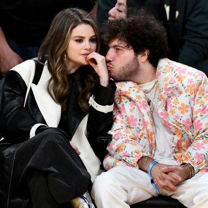 Selena Gomez and Benny Blanco watch a Los Angeles Lakers basketball game