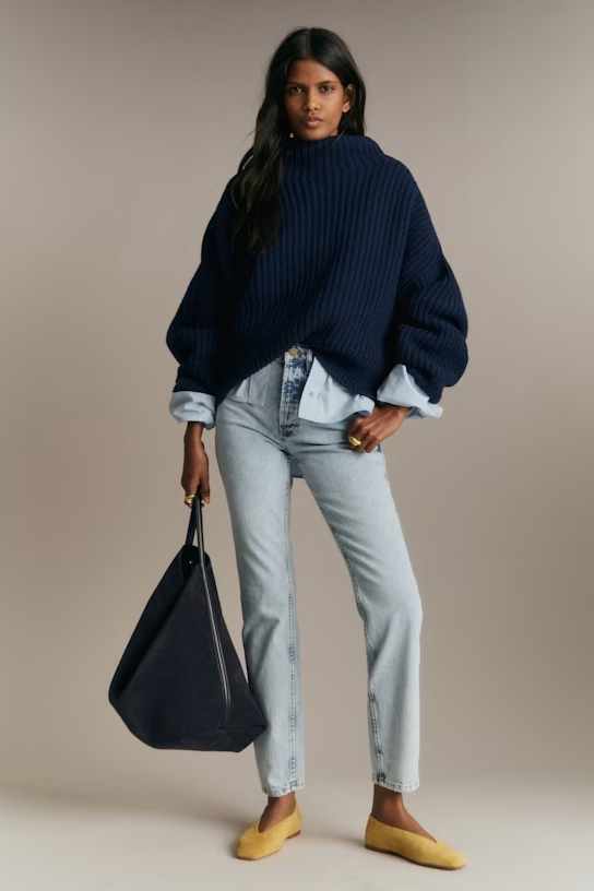 A model wearing light-wash jeans.