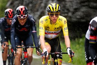 TIGNES FRANCE JULY 04 Tadej Pogaar of Slovenia and UAETeam Emirates yellow leader jersey during the 108th Tour de France 2021 Stage 9 a 1449km stage from Cluses to Tignes Monte de Tignes 2107m LeTour TDF2021 on July 04 2021 in Tignes France Photo by Chris GraythenGetty Images