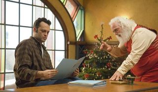 Fred Claus with Santa