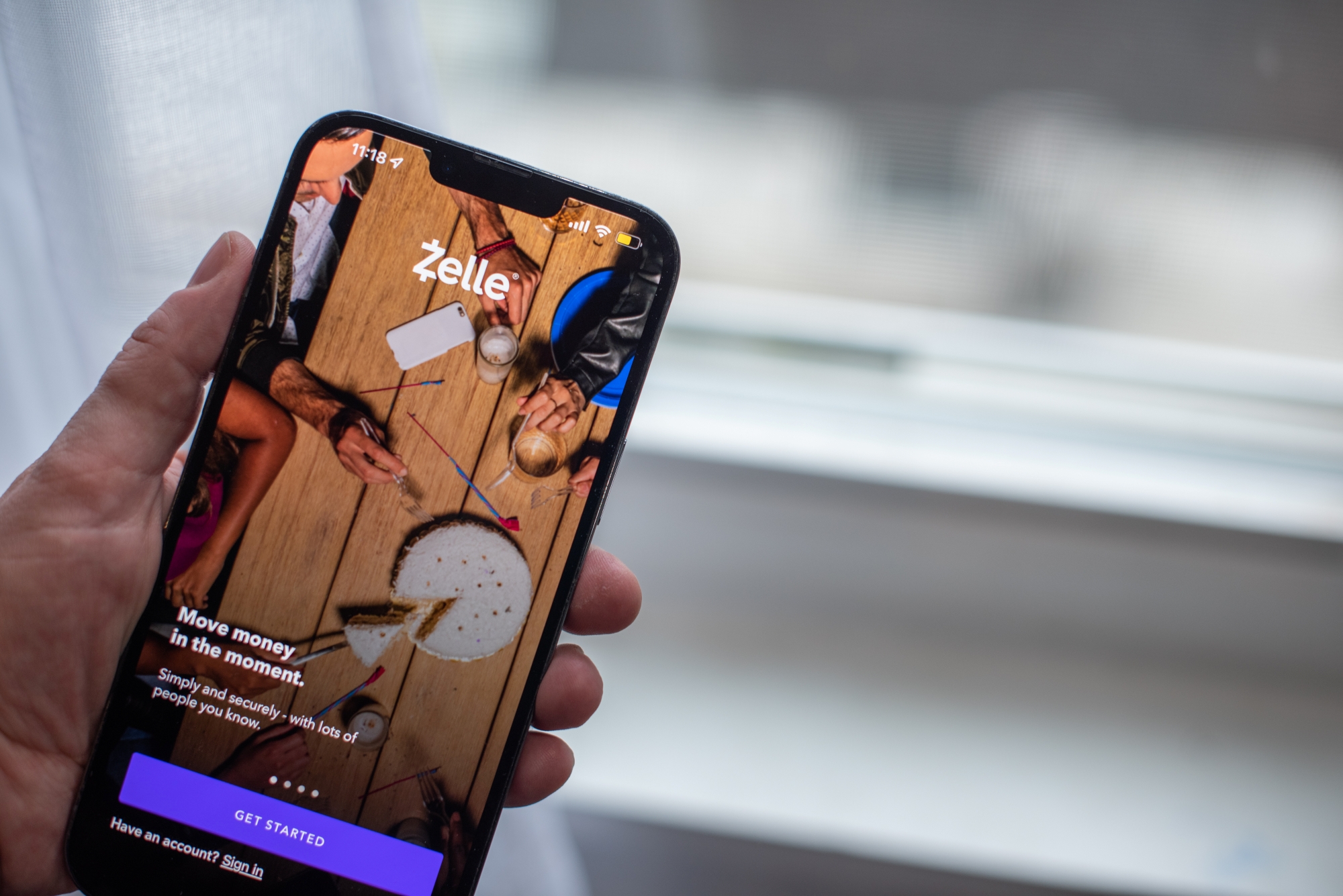 Zelle app promising secure payments displayed on smartphone screen.