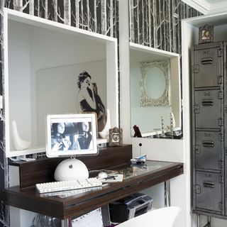 home office with white wall and black texture and desk with computer
